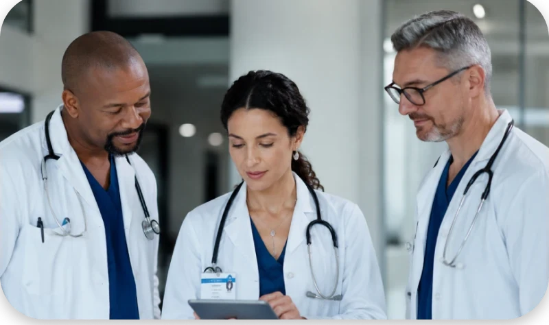 Physicians reviewing patient charts